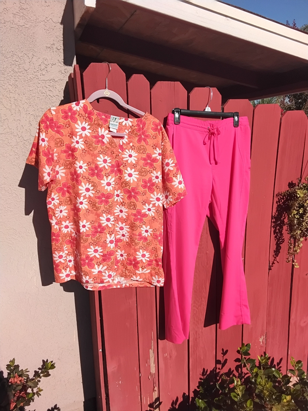 Uniform Advantage Floral Orange Scrub Top with Pink Scrub Pants